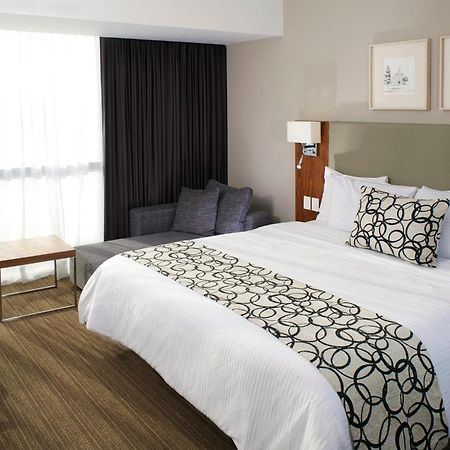 Casa Inn Premium Hotel Queretaro Miranda Dış mekan fotoğraf A bed runner