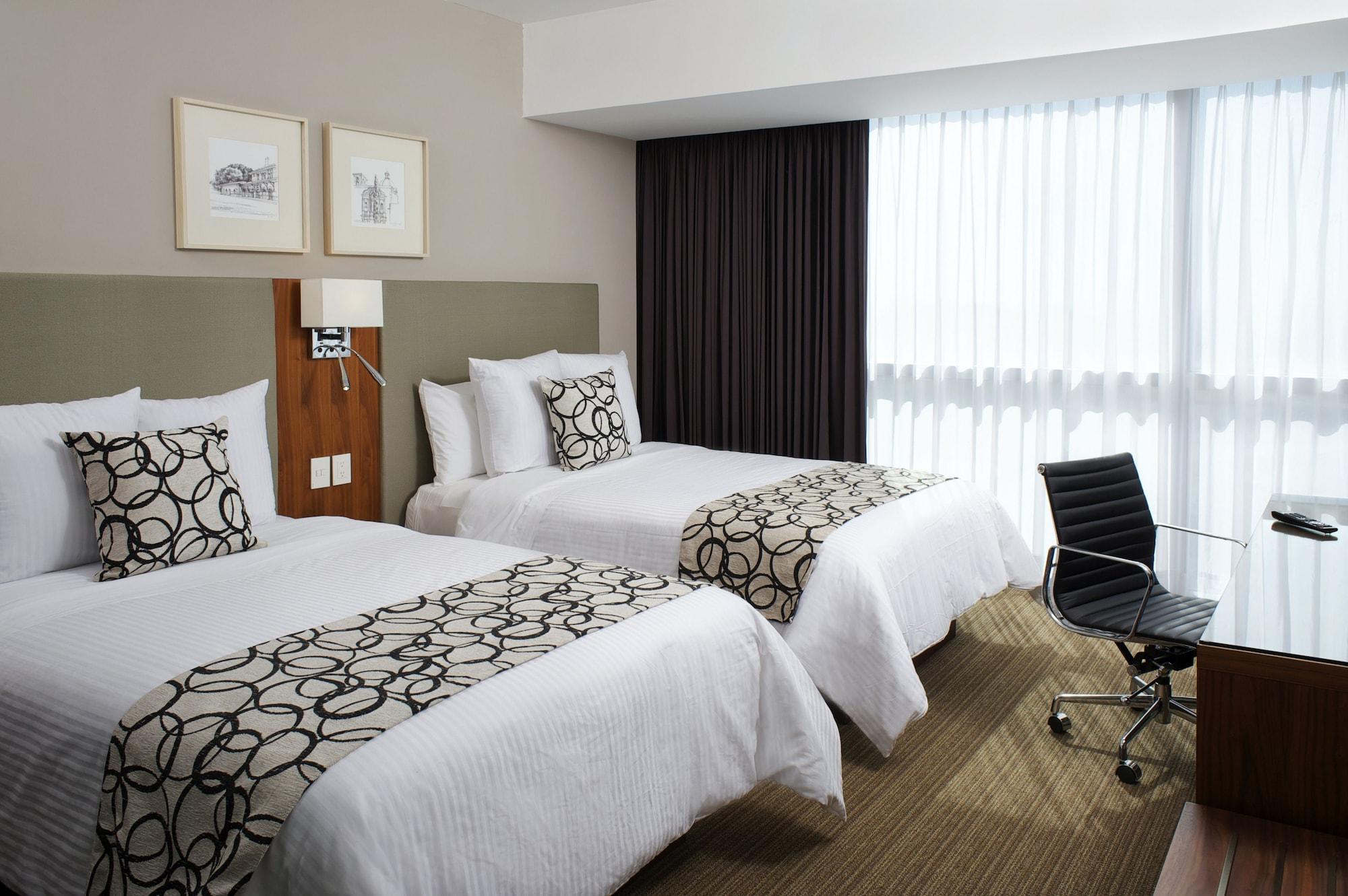 Casa Inn Premium Hotel Queretaro Miranda Dış mekan fotoğraf A room at the hotel