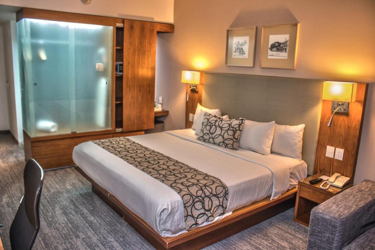 Casa Inn Premium Hotel Queretaro Miranda Dış mekan fotoğraf A room at the hotel