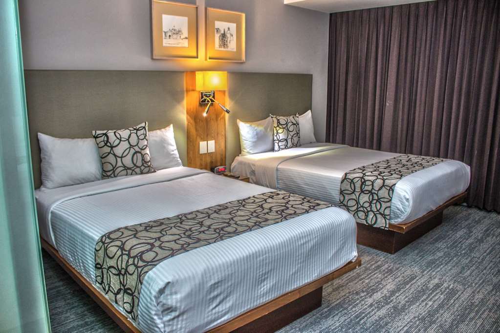 Casa Inn Premium Hotel Queretaro Miranda Oda fotoğraf A room at the hotel